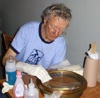 Jim Daley cleaning the objective
