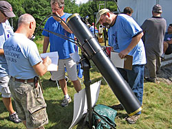 Mechanical Judges examine a Telescope