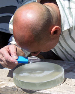 Checking for large pits in the bright sun